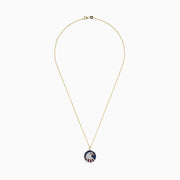 The Novelty 14K Gold Ruby, Sapphire & Diamond Eagle Head Pendant (1.06 TCW) features a round pendant with a stylized eagle head and patriotic background, embellished with ruby, sapphire, and diamond stones.