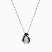 The Safari Sterling Silver Diamond and Black Sapphire Penguin Pendant, 1.03 TCW, features sparkling stones on a penguin-shaped design and is shown against a plain white background.