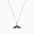 The Seaside 14K Gold Blue and White Diamond Whales Tail Pendant (0.28 TCW) features sparkling blue and white diamonds on a thin, elegant chain, beautifully displayed against a plain white background.