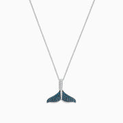 The Seaside 14K Gold Blue and White Diamond Whales Tail Pendant (0.28 TCW) features sparkling blue and white diamonds on a thin, elegant chain, beautifully displayed against a plain white background.