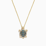 14K yellow gold sea turtle pendant necklace featuring blue and white diamonds (0.41 TCW) on the shell, shown against a white background.