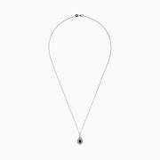 The Royale Bleu 14K Two Tone Gold Sapphire and Diamond Pendant features a teardrop-shaped blue sapphire surrounded by diamonds, set on a silver chain with elegant gold accents, totaling 0.38 TCW.