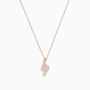The Novelty 14K Rose Gold Diamond Music Note Pendant features a sparkling diamond-encrusted music note on a delicate rose gold chain, displayed on a white background.