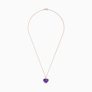 The 14K Rose Gold Amethyst and Diamond Heart Pendant (10.32 TCW) features a heart-shaped amethyst center with a vertical row of sparkling diamonds above, displayed on a rose gold chain against a white background.
