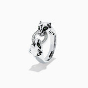The Signature Sterling Silver Diamond Panther Ring, 0.09 TCW, features two panther heads with green gemstone eyes gripping a diamond-set circle in their mouths—an elegant and detailed design against a white backdrop.
