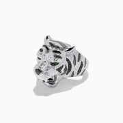 The Sterling Silver Black Diamond and Tsavorite Tiger Ring, 0.21 TCW, features a tiger’s head design with detailed fur, black diamonds, and vivid green Tsavorite eyes, displayed against a white background.