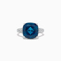 The Ocean Bleu 14K Gold London Blue Topaz and Diamond Ring (8.69 TCW) features a bold cushion-cut center stone accented by round white diamonds along the band, displayed on a plain white background.