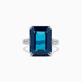 The Ocean Bleu 14K Gold London Blue Topaz and Diamond Ring, 15.14 TCW, features a rectangular emerald-cut topaz center and side diamonds, displayed against a plain white background.