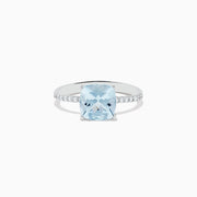 The Aquarius 14K White Gold Aquamarine and Diamond Ring features a cushion-cut aquamarine centerpiece accented by sparkling diamonds along the band.