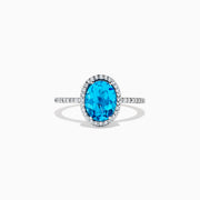 The Ocean Bleu 14K White Gold Blue Topaz and Diamond Ring, 2.51 TCW, showcases an oval blue topaz center with a diamond halo and additional diamonds along the band.