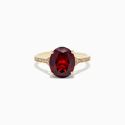 The Bordeaux 14K Yellow Gold Garnet and Diamond Ring, 4.76 TCW, showcases a large oval deep red garnet center with sparkling diamonds along the band.