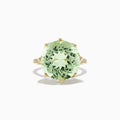 The 14K Yellow Gold Green Amethyst and Diamond Cocktail Ring, 11.95 TCW, features a large faceted green amethyst in a prong setting, shown from above on a white background.