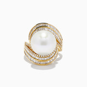 The 14K Yellow Gold Fresh Water Pearl and Diamond Statement Ring showcases a large central freshwater pearl, accented by curved rows of rectangular diamonds on the band, set against a white background.