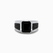 The Mens 925 Sterling Silver Onyx and Black Spinel Ring features a large rectangular black onyx centerpiece, accented by small round black spinel stones set along each side of the band, displayed on a white background.