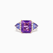 The 14K Rose Gold Amethyst, Tanzanite and Diamond Ring (7.49 TCW) showcases a large rectangular amethyst center, two triangular tanzanites, and four round diamonds on each side, all set against a white background.