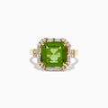 The 14K Yellow Gold Peridot and Diamond Ring showcases a large square-cut peridot center stone, accented by small round and rectangular diamonds, displayed on a plain white background.