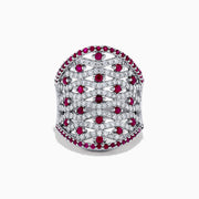 The 14K White Gold Ruby and Diamond Ring, 2.11 TCW, features rows of sparkling diamonds in a lattice pattern, accented with small round rubies along the edges and at the center of each diamond cluster.