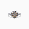 The 14K White Gold Espresso and White Diamond Flower Ring, 0.70 TCW, features a split shank with a central cluster of brown stones surrounded by two rows of white diamonds, creating an elegant geometric floral design.