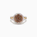 The 14K Yellow Gold Espresso and White Diamond Ring features a round cluster of brown diamonds, haloed by white diamonds with more along the split shank. Totaling 1.45 TCW, this elegant ring highlights each white diamond’s brilliance.