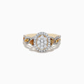 A 14K Yellow Gold ring showcasing white and fancy yellow diamonds in an oval cluster design, with a total carat weight of 1.00 TCW.