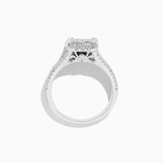 The 14K White Gold Diamond Ring, 1.50 TCW, showcases a square diamond cluster center and sparkling diamonds on a split shank band, all set against a plain white background for an elegant look.
