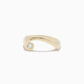 The DOro 14K Yellow Gold Diamond Swirl Ring features a modern twisted band with a single round diamond at one end, shown on a white background.