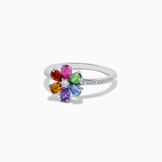 The Watercolors 14K White Gold Diamond and Multi Sapphire Flower Ring by Effy features a silver flower-shaped cluster of colorful sapphires around a central diamond, with additional diamonds set along the band for extra sparkle.
