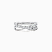 The 925 Sterling Silver Diamond Crossover Ring, 0.23 TCW, features one twisted diamond-encrusted band intertwined with a polished silver band, set against a plain white background.