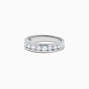 The Bridal 14K White Gold Channel Set Diamond Band, 0.98 TCW, displays brilliant diamonds in a sleek channel setting, elegantly highlighted on a plain white background.