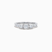 The Bridal 14K White Gold Diamond Three Stone Ring, 0.39 TCW, features three center diamonds with smaller round and baguette-cut stones along the band, shown on a white background.