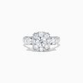 The Bouquet 14K White Gold Diamond Engagement Ring features a large round center diamond, a halo of sparkling stones, and diamonds along the band for added brilliance. Shown on a white background. Total carat weight: 1.91 TCW.