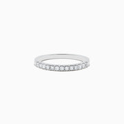 The Pave Classica 14K White Gold Diamond Engagement & Wedding Ring Set 1.34 TCW features a round center diamond, a sparkling diamond halo, and additional diamonds on the split band, shown against a white background.