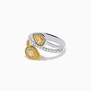 The Canare 18K Two-Tone Gold Pear Shaped Yellow Diamond Bypass Ring features two diamond clusters—one in yellow gold, one in white gold—joined by a split band with round diamonds.