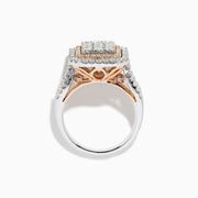 The Bouquet Two Tone Gold Diamond Ring features a rectangular diamond center with multiple rows of round diamonds, rose gold accents, and a two-tone gold band.
