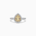 The Canare 14K Two Tone Gold Yellow and White Diamond Ring features a pear-shaped yellow diamond with a double halo of white and yellow diamonds, set on a two tone gold band adorned with small round diamonds.