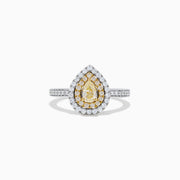 The Canare 14K Two Tone Gold Yellow and White Diamond Ring features a pear-shaped yellow diamond with a double halo of white and yellow diamonds, set on a two tone gold band adorned with small round diamonds.