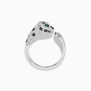 The Signature 14K White Gold and Emerald Panther Ring features a panther’s diamond-adorned head, vibrant emerald eyes, and diamond-accented band, all set in sleek white gold against a crisp white background.