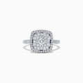 The Pave Classica 14K White Gold Diamond Ring, 0.83, showcases a cushion-shaped cluster of round diamonds with a double halo and diamond-encrusted band, displayed on a white background.