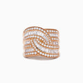 The 14K Rose Gold Diamond Crossover Ring features wavy rows of baguette and round diamonds in a woven, overlapping design that sparkles elegantly on a white background.