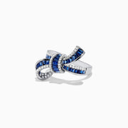 The Royal Bleu 14K White Gold Sapphire and Diamond Bow Ring, 1.88 TCW, features a bow design with sapphire rows bordered by diamonds, displayed against a white background.