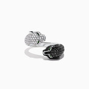 The Signature 14K Gold Black & White Diamond Double Panther Ring, 1.49 TCW, features two panther heads—one with black stones, the other with white—each set with vivid green gemstone eyes.