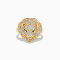 The Mens 14K Yellow Gold Emerald and Diamond Lion Ring features a lions head design with diamond accents and emerald eyes, showcased against a white background.