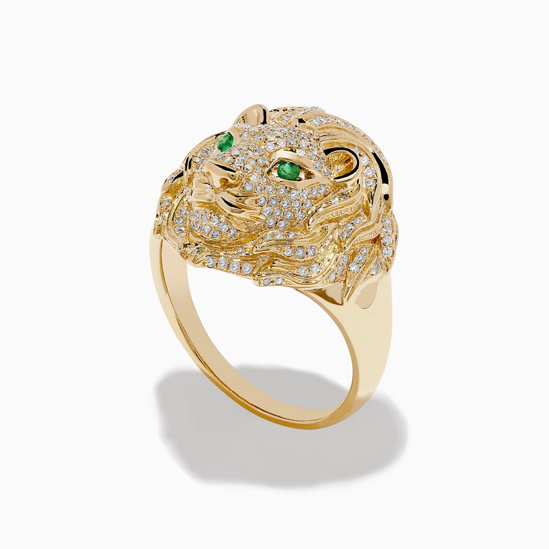 The Mens 14K Yellow Gold Emerald and Diamond Lion Ring features a lions head design with diamond accents and emerald eyes, showcased against a white background.