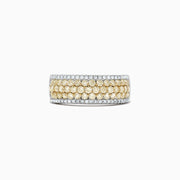The Canare 14K Two Tone Gold Yellow and White Diamond Ring, 1.26 TCW, features three rows of round yellow diamonds bordered by two rows of white diamonds, all set in elegant two-tone gold and shown on a white background.