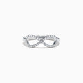 14K White Gold Diamond Infinity Pinky Ring, 0.13 TCW, features a diamond-studded infinity symbol design and is displayed on a white background.
