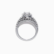 The Classique 14K White Gold Diamond Ring, 1.21 TCW, showcases an emerald-cut center diamond with a halo of round diamonds and baguette accents, set in luxurious 14K white gold against a white background.