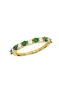 The Gemma Emerald and Diamond Ring features alternating round green emeralds and white diamonds in a continuous pattern, totaling 0.73 TCW.