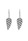 A pair of 14K White Gold Black and White Diamond Earrings (1.05 TCW), featuring a leaf-like design with sparkling stones, displayed on a white background.