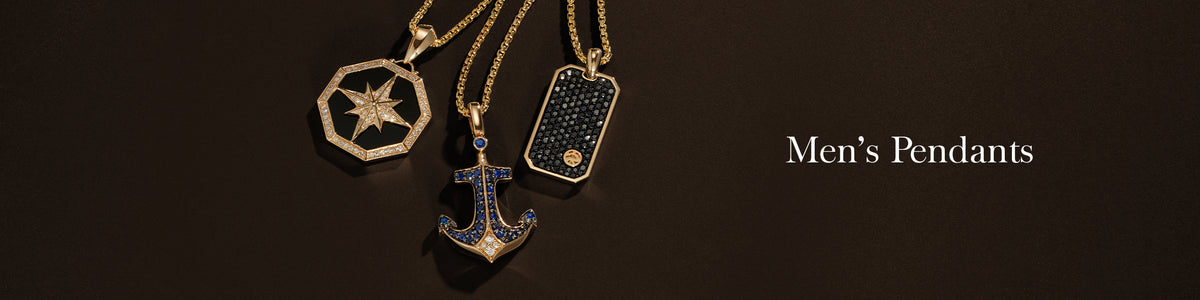 Three gold mens pendants on chains are displayed against a dark background: a star, a rectangular design, and a jeweled anchor. The text reads “Men’s Pendants.”.