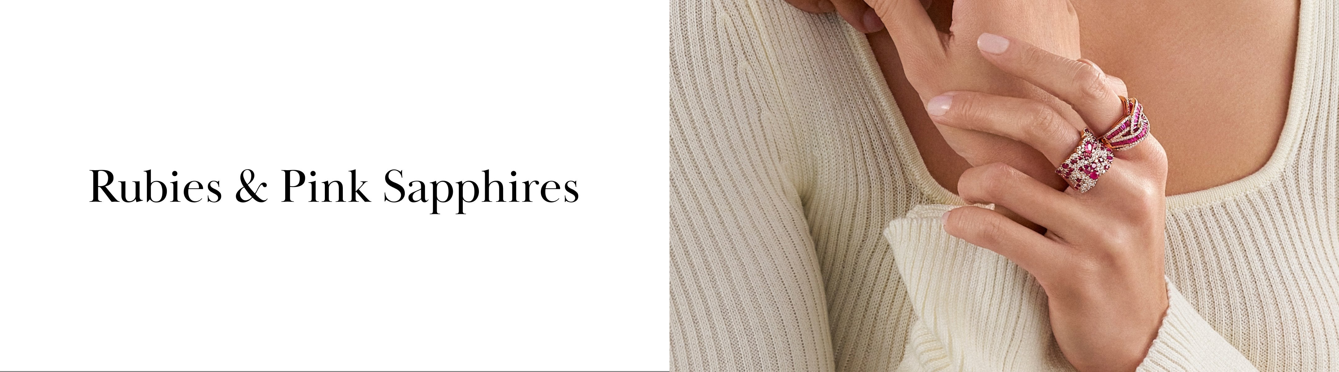 A woman wearing several rings with rubies and pink sapphires on her fingers, dressed in a white ribbed knit top. Text on the left reads Rubies & Pink Sapphires.